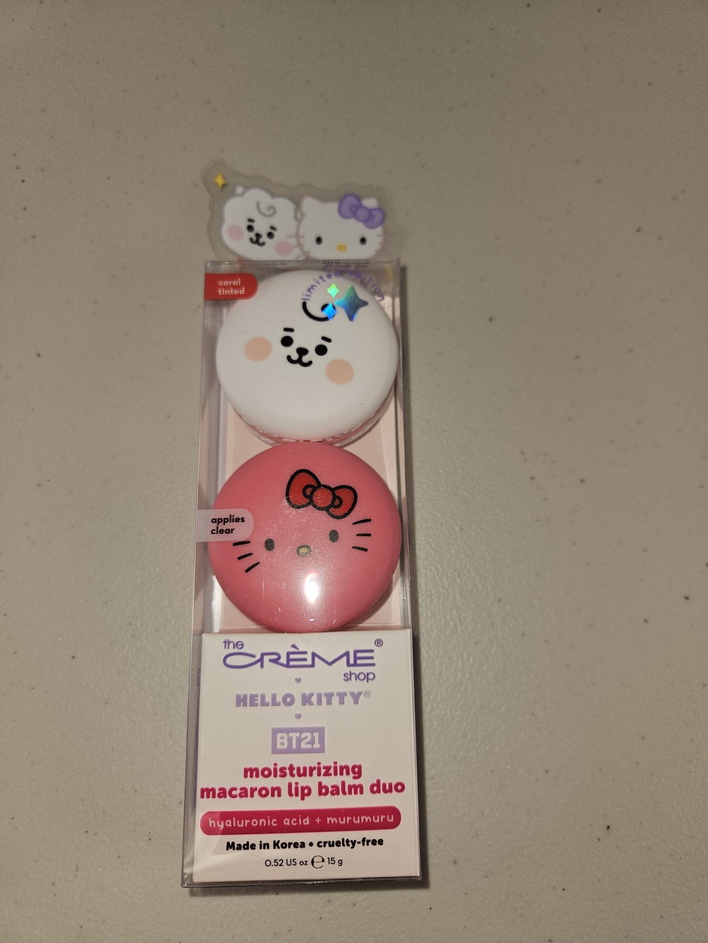 Hello Kitty Macaroon Lip balm Duo product mistaken for phone accessory